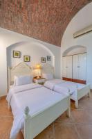 Postel nebo postele na pokoji v ubytování VESTA - El Gouna Residence