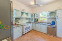Kuchyň nebo kuchyňský kout v ubytování VESTA - El Gouna Residence