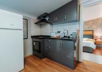A kitchen or kitchenette at Umut Apartments