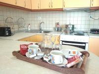 A kitchen or kitchenette at MARMARI MEGALI AMMOS OASIS Apartment & Studio