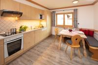Kuchyň nebo kuchyňský kout v ubytování "Ferienwohnung Anna" - Annehmlichkeiten von 4-Sterne Familien-und Wellnesshotel Viktoria können mitgenutzt werden