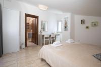 Posteľ alebo postele v izbe v ubytovaní Apartments Villa Nina