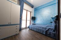 Posteľ alebo postele v izbe v ubytovaní VILLA IARA