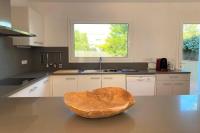 A kitchen or kitchenette at LLEBEIG -Casa mediterránea con gran jardín