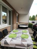 Posedenie v ubytovaní Mango Wellness Apartman