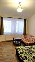 Postel nebo postele na pokoji v ubytování Apartmány Kukaččí hnízdo
