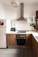 A kitchen or kitchenette at Family ARTpartment