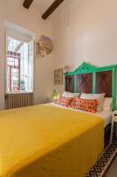 A bed or beds in a room at Family ARTpartment