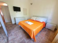 Posteľ alebo postele v izbe v ubytovaní Villa Caterina Posada