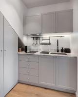 Kuchyň nebo kuchyňský kout v ubytování ONOS RESIDENCE