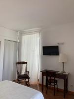 Televízia a/alebo spoločenská miestnosť v ubytovaní La Casa Del Sole