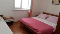Posteľ alebo postele v izbe v ubytovaní Apartment in Kustici with sea view, balcony, air conditioning, WiFi (3597-1)
