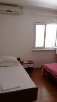 Posteľ alebo postele v izbe v ubytovaní Apartment in Kustici with sea view, balcony, air conditioning, WiFi (3597-1)
