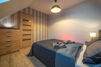 Posteľ alebo postele v izbe v ubytovaní Apartamenty Bunny Aparts