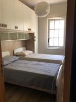 A bed or beds in a room at Villa Cataleya