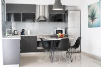 Kuchyň nebo kuchyňský kout v ubytování Aelia Apartments
