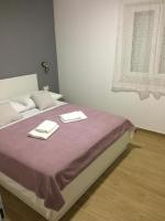 Posteľ alebo postele v izbe v ubytovaní Apartment in Podgora with Terrace, Air conditioning, Wi-Fi (4492-6)