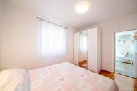 Postel nebo postele na pokoji v ubytování Bungalows Ivan (3757)