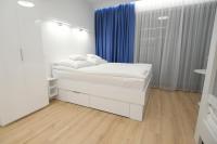 Posteľ alebo postele v izbe v ubytovaní Blue Sky Apartments Rezydencja Niechorze - 302