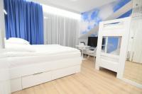 Posteľ alebo postele v izbe v ubytovaní Blue Sky Apartments Rezydencja Niechorze - 302
