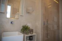 A bathroom at Palazzo Lecce - Epoca Collection