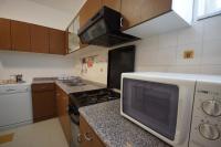 Kuchyň nebo kuchyňský kout v ubytování Apartment in Stara Novalja with sea view, terrace, air conditioning, WiFi (183-3)