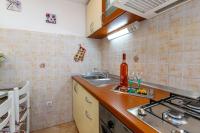 Kuchyň nebo kuchyňský kout v ubytování Holiday House Emma