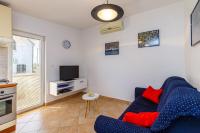 TV a/nebo společenská místnost v ubytování Holiday House Emma