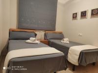 Posteľ alebo postele v izbe v ubytovaní APARTAMENTO CON TERRAZA, VISTAS AL MAR Y PISCINA