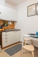Kuchnia lub aneks kuchenny w obiekcie Apartamenty Starówka