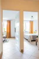 Łóżko lub łóżka w pokoju w obiekcie Apartamenty Starówka