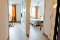 Łóżko lub łóżka w pokoju w obiekcie Apartamenty Starówka