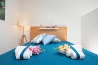 A bed or beds in a room at Splendida Villa NATURE- APPARTAMENTO ARANCIO a Scopello - Zingaro