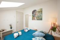 A bed or beds in a room at Splendida Villa NATURE- APPARTAMENTO ARANCIO a Scopello - Zingaro