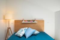 A bed or beds in a room at Splendida Villa NATURE- APPARTAMENTO ARANCIO a Scopello - Zingaro