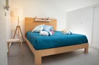 A bed or beds in a room at Splendida Villa NATURE- APPARTAMENTO ARANCIO a Scopello - Zingaro