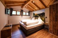 Postel nebo postele na pokoji v ubytování Landhaus Eggensberger