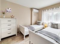Posteľ alebo postele v izbe v ubytovaní Vintage apartman