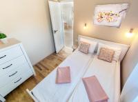 Posteľ alebo postele v izbe v ubytovaní Vintage apartman