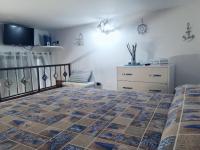 Posteľ alebo postele v izbe v ubytovaní Holiday House Piccirillo