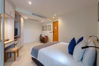 Postel nebo postele na pokoji v ubytování Splash Beach Resort, Maikhao Phuket - SHA Extra Plus