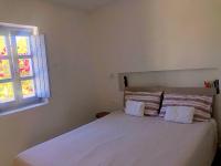 A bed or beds in a room at Thera Incognita Studios