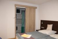 Posteľ alebo postele v izbe v ubytovaní Czermann Holiday Inn