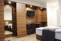 Posteľ alebo postele v izbe v ubytovaní Czermann Holiday Inn