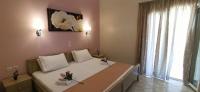Postel nebo postele na pokoji v ubytování Villa Perkemes Apartments Parga