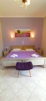 Postel nebo postele na pokoji v ubytování Villa Perkemes Apartments Parga