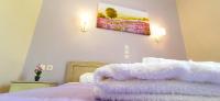 Postel nebo postele na pokoji v ubytování Villa Perkemes Apartments Parga