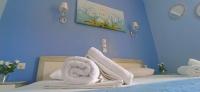 Postel nebo postele na pokoji v ubytování Villa Perkemes Apartments Parga