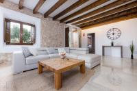 Posezení v ubytování YourHouse Sa Riba Villa