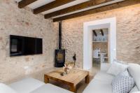 TV a/nebo společenská místnost v ubytování YourHouse Sa Riba Villa
